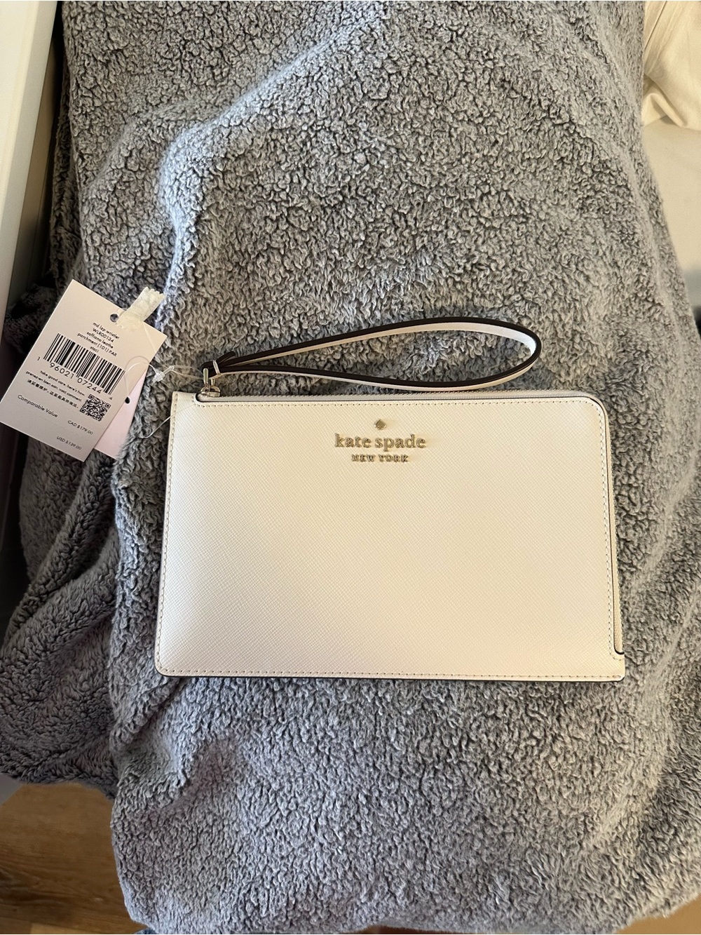 kate spade White Saffiano Leather Wristlet with Gold Logo